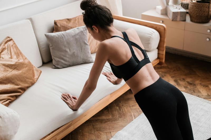 Woman doing push ups at home